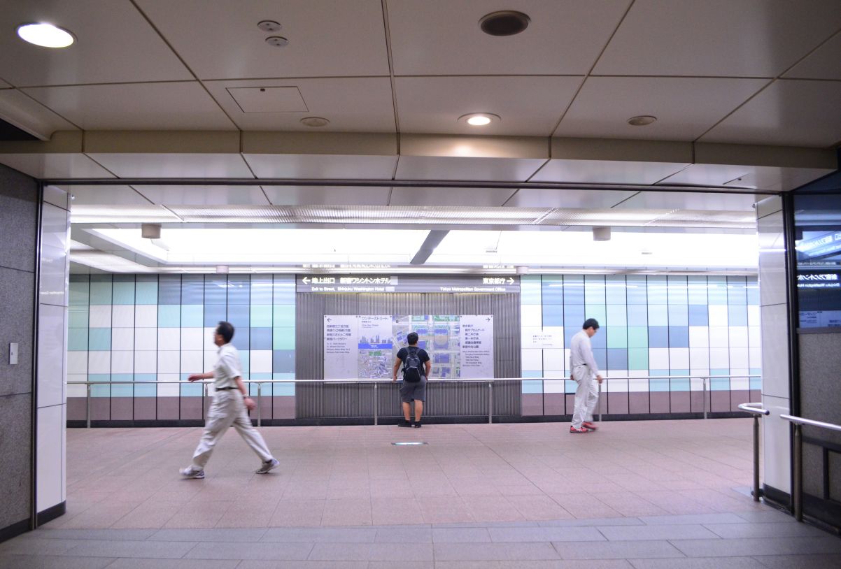 Man looking at information board