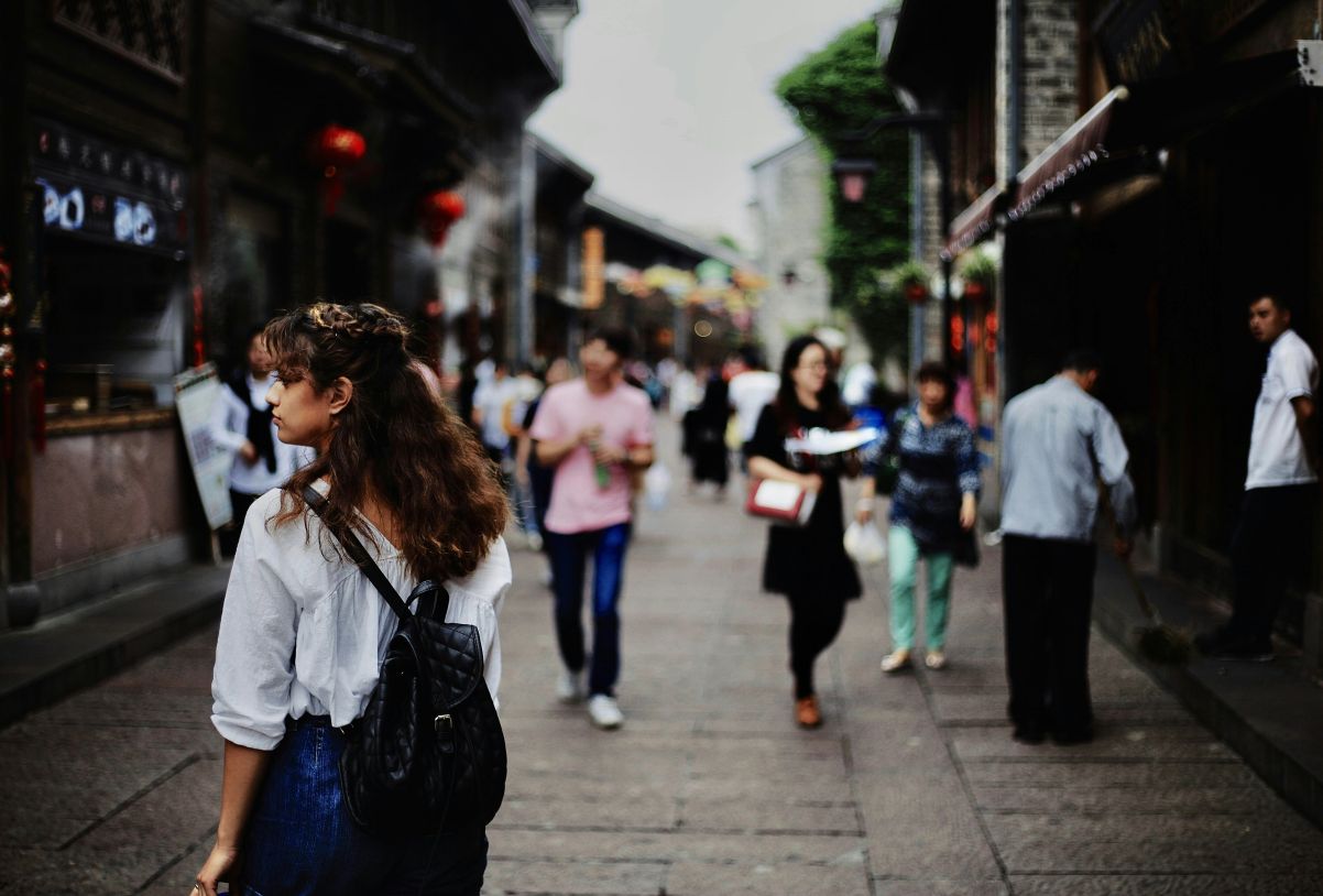 Woman walking in city