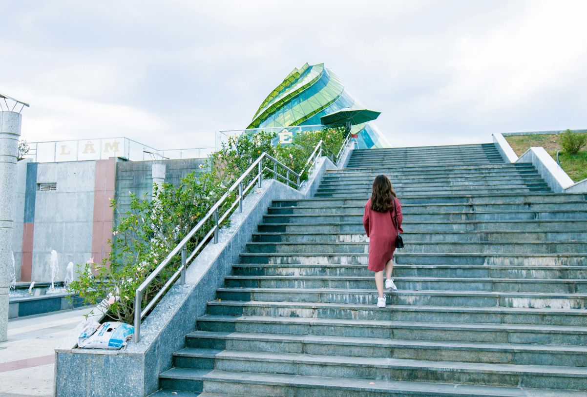 Woman walking up stairs